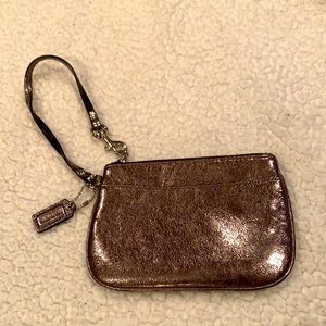 Coach bronze wristlet